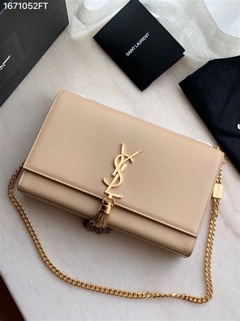 ysl beige clutch bag|ysl clutch bag with tassel.